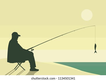 Fisherman with a catch at sunset. an elderly fisherman proudly shows off a caught fish