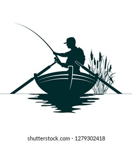 Fisherman with a fishing rod in the boat and reeds