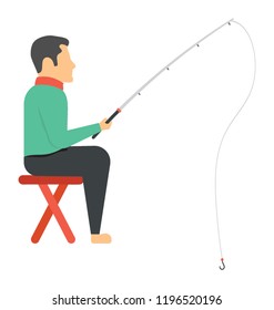 
Fisherman holding a sea bass with fishing rod 
