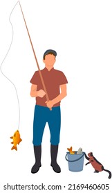 Fisherman with rod spending time outdoor with pet. Fisher standing with fishing rod and full bucket. Cat playing with catch. Man fishing, catching fish with kitten. Caring for animals, pets concept