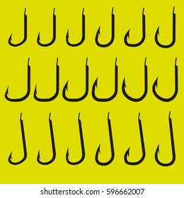 fishing hooks set on yellow background