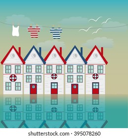 Fishing house, tiny white house, sea and vast sky with seagulls.