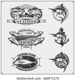 Fishing labels, badges, emblems and design elements. Illustrations of Tuna and Marlin.