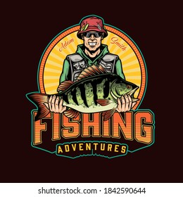 Fishing vintage badge with smiling angler in panama hat and sunglasses holding big perch isolated vector illustration