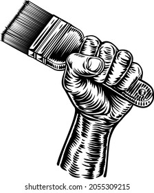 A fist hand holding a decorators paintbrush in a vintage intaglio woodcut engraved or retro propaganda style