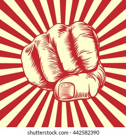 Fist punching in a vintage propaganda poster woodcut style