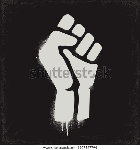 Fist raised in protest. Fist icon isolated\
on a dark background. Vector\
illustration