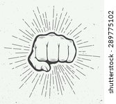 Fist with sunbursts in vintage style. Vector illustration