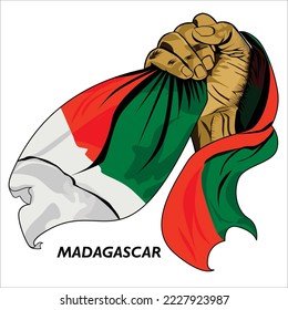 Fisted hand holding Madagascan flag. Vector illustration of lifted Hand grabbing flag. Flag draping around hand. Scalable Eps format	