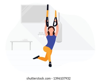 Fit woman working out on trx doing bodyweight exercises. Fitness strength training workout.