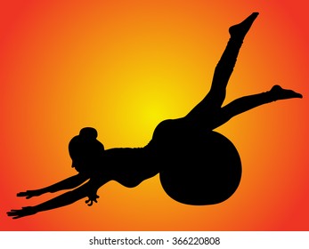 Fit young pilates instructor showing exercises