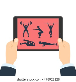 Fitness app for tablet. Hands holding tablet. Bodybuilding app. How to do gym exercises like lifting weights, pull ups, crunches, squats and plank.