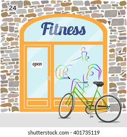 Fitness club building. Facade of stone. Fitness logo on the window. Bike at the fore. EPS10