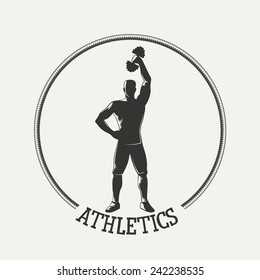 Fitness emblem. Silhouette strong man lifting dumbbell.  Vintage Style illustration. 