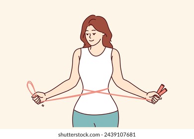 Fitness woman training with jump rope in hands, showing off slender figure and thin waist. Girl fitness trainer in sportswear recommends doing sports to get rid of excess weight and health problems.