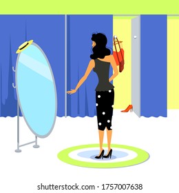 Fitting rooms with curtains and mirrors in a clothes shop. The girl tried on the dress. Fitting room in blue shades.