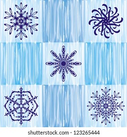 five blue snowflakes on icy vintage background
