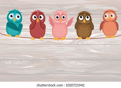 Five cute colored owlet sitting on a rope. A red hearts with a picture hanging on a rope.  Valentine's Day. Vector illustration on wooden background. Greeting card with empty space for the label or ad