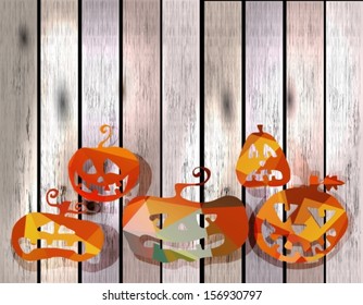 five different Halloween pumpkins over wood background, Vector