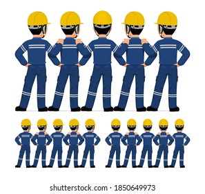 Five industrial workers standing together on white background
