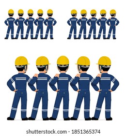 Five industrial workers standing together on white background