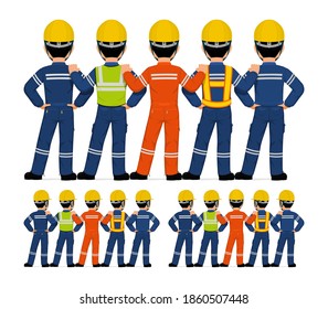 Five industrial workers standing together on white background