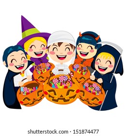 Five kids doing Halloween Trick or Treat holding pumpkin bags full of candy isolated on white background