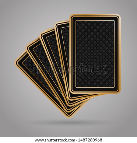 Five poker playing cards on grey background. Black and gold back side design