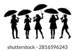Five women standing together holding black umbrellas silhouette style