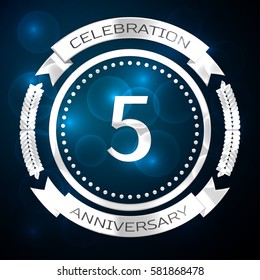 Five years anniversary celebration with silver ring and ribbon on blue background. Vector illustration