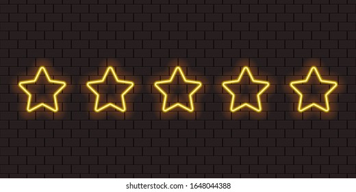 Five yellow neon rating stars on a dark brick wall.