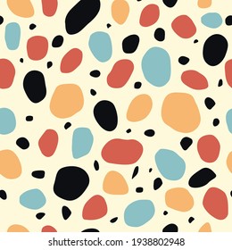 A five-color pattern with jagged oval objects for use as a background
