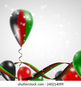 Flag of Afghanistan on balloon. Celebration and gifts. Ribbon in the colors are twisted. Balloons on the feast of the national day. 