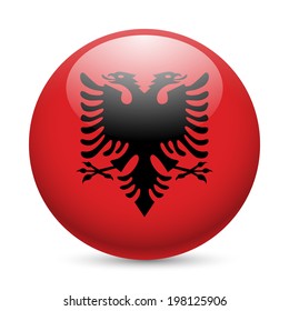 Flag of Albania as round glossy icon. Button with Albanian flag