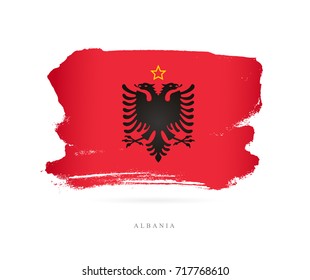 Flag of Albania. Vector illustration on white background. A beautiful brush stroke. Abstract concept. Elements for design.