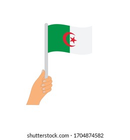 Flag of Algeria   . Hand holding a Algeria   flag - vector icon.
