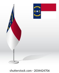 flag of american state of North Carolina on flagpole for registration of solemn event. Day of state of North Carolina. Realistic 3D vector on white