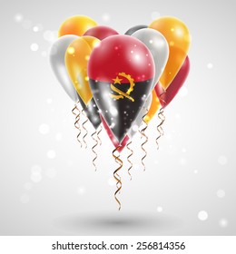 flag of Angola on air balls in heart-shaped. Celebration and gifts. Ribbon in the colors are twisted under the balloon. Independence Day. Balloons on the feast of the national