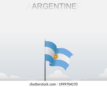 The flag of Argentina flutters on a pole that stands tall under a white sky