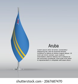 Flag of Aruba hanging on a flagpole stands on the table. Vector illustration