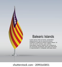 Flag of Balearic Islands of Spain hanging on a flagpole stands on the table. Vector illustration