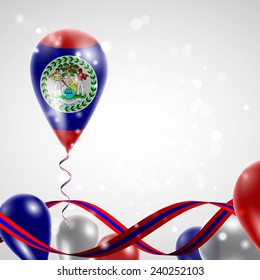 Flag of Belize on balloon. Celebration and gifts. Ribbon in the colors are twisted. Balloons on the feast of the national day. 