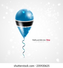 Flag of Botswana. Celebration and gifts. Ribbon in the colors are twisted under the balloon. Independence Day. Balloons on the feast of the national