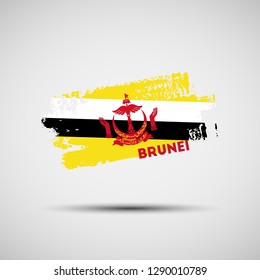 Flag of Brunei. Vector illustration of grunge brush stroke with Bruneian national flag colors for your graphic and web design
