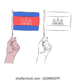 The flag of Cambodia is in the hand of a man in color and black and white. The concept of patriotism.