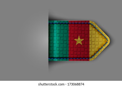 Flag of Cameroon in the form of a glossy textured label or bookmark. Vector illustration.
