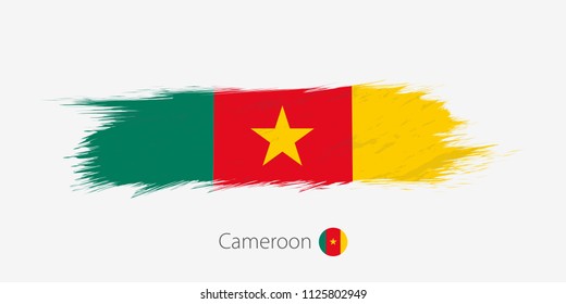 Flag of Cameroon, grunge abstract brush stroke on gray background. Vector illustration.