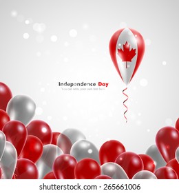 Flag of Canada on balloon. Celebration and gifts. Ribbon in the colors are twisted. Independence Day. Balloons on the feast of the national