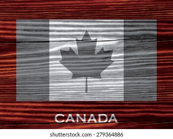 Flag of Canada on wooden background