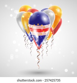 Flag of Cape Verde on air balls in heart-shaped. Celebration and gifts. Ribbon in  colors are twisted under the balloon. Independence Day. Balloons on the feast of the national